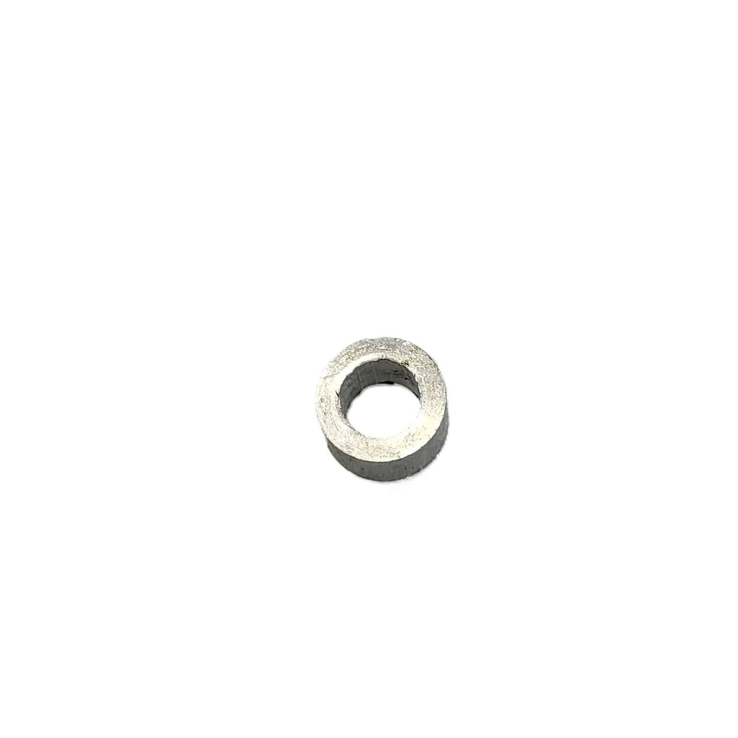 Collar or small mechanical bushing that is placed between the seatbelt mounting bolt and vehicle frame. this allows the seatbelt buckle or guide move freely and not rub against the interior upholstery, trim, or any other hardware